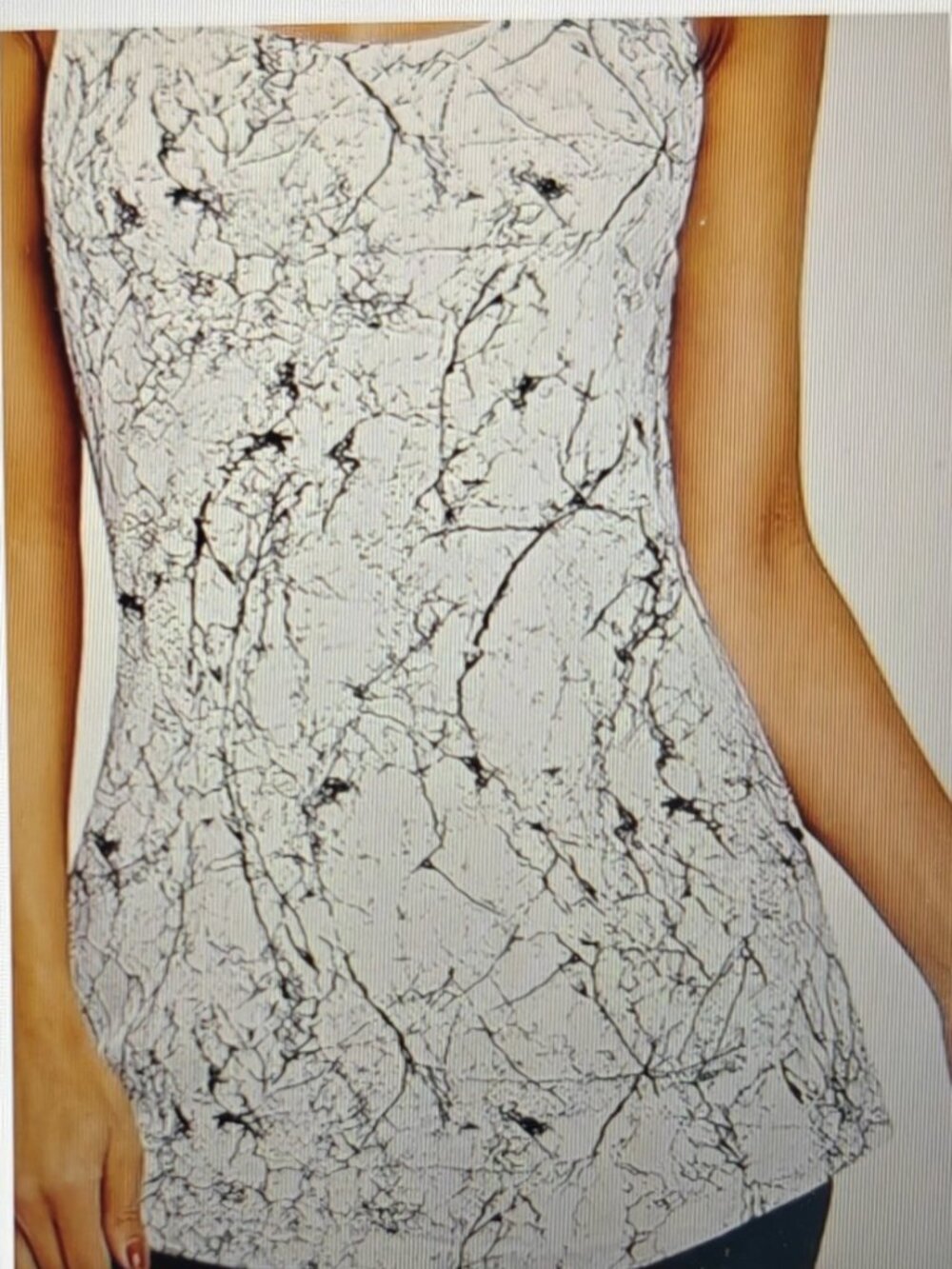 Ladies white with black print loose fitting tank toop with built in bra